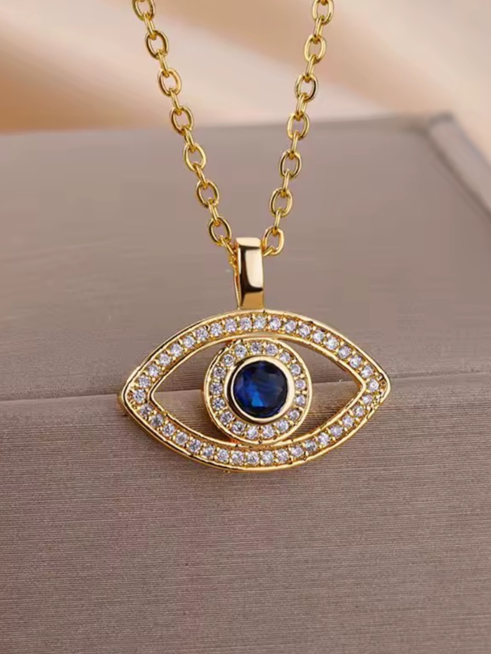 Gold Evil Eye Necklace with Blue Center and Crystal Accents